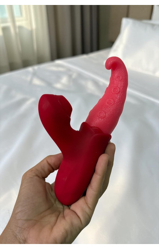 Vibrador Sugador com Movimento de Língua Tong