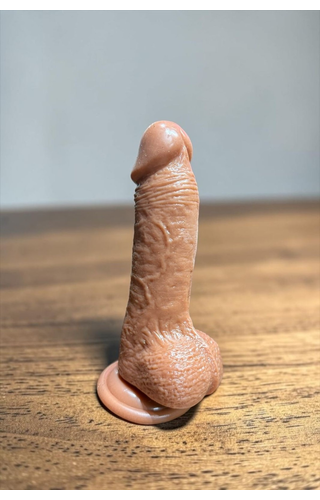 PÊNIS EM SILICONE COM VEMTOSA 18 X 3,5CM