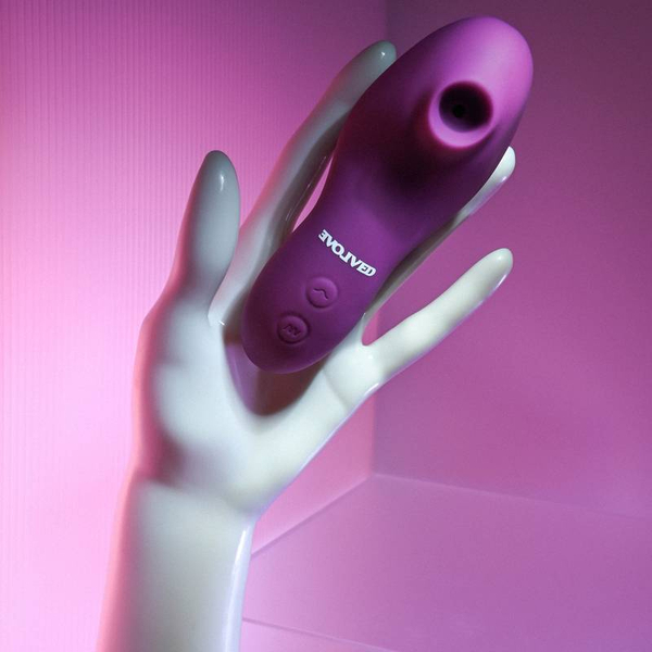 SUGADOR E VIBRADOR DE CLITÓRIS COM APOIO PARA DEDO