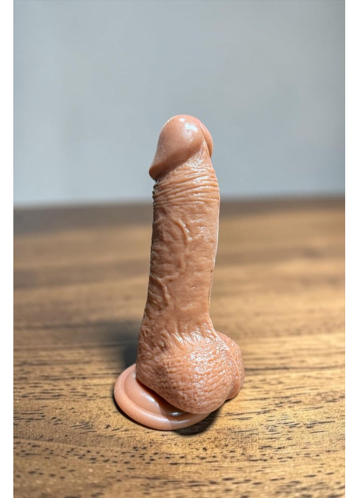 PÊNIS EM SILICONE COM VEMTOSA 18 X 3,5CM